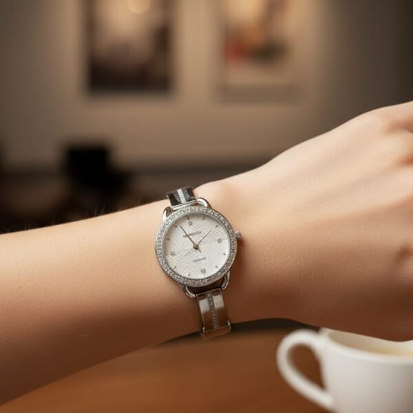 women's silver tone quartz watch with crystal encrusted bezel