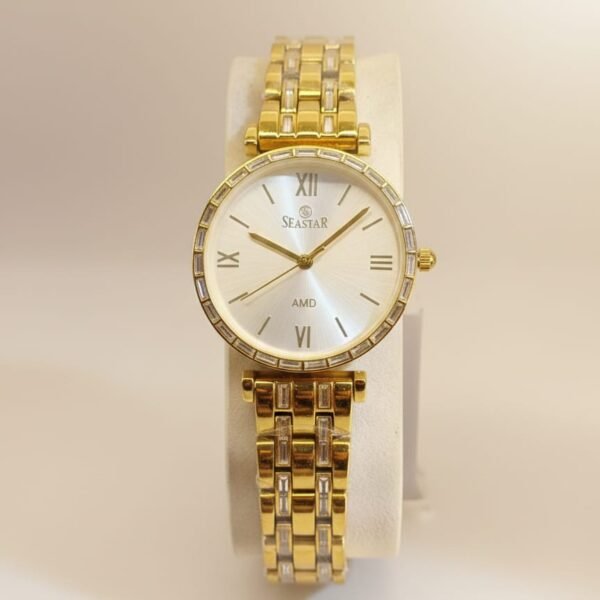luxury seastar women’s gold bracelet watch – baguette crystal bezel with sunray dial & roman numerals