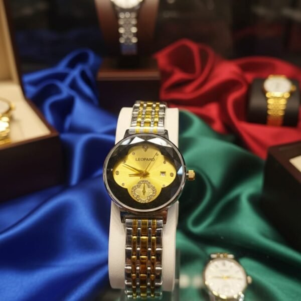 leopard women’s two tone gold & silver watch – faceted diamond cut glass with gold sunray dial & date window