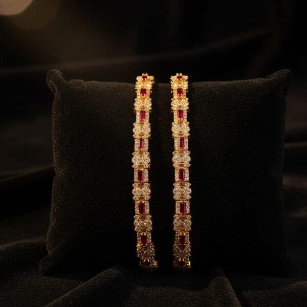 likely gold plated stainless steel or high quality alloy with a polished finish. band style: a hybrid design. the top portion features a brick link pattern (multi link) that transitions into a solid, smooth bangle style cuff at the back. closure: typically features a jewelry style clasp or a hinged spring opening for a seamless "bracelet" look on the wrist.